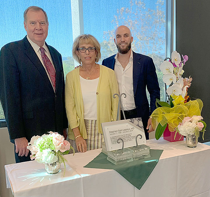 Dedication ceremony of a plague in honor of ER founder Stephen Lazarus.